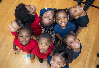 Ariel shot of preschool children posing for a photo