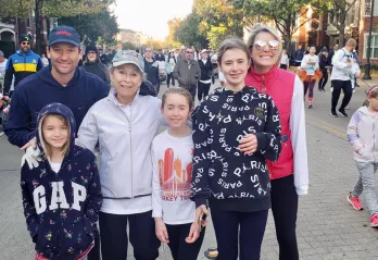Photo of Jane, her family, and mother at Turkey Trot
