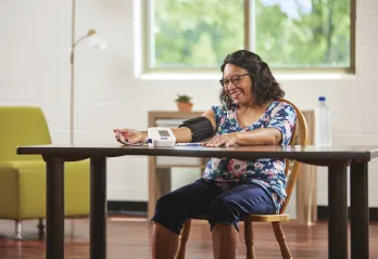 lady checking her blood pressure