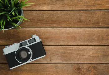 Photo of Camera with wood background