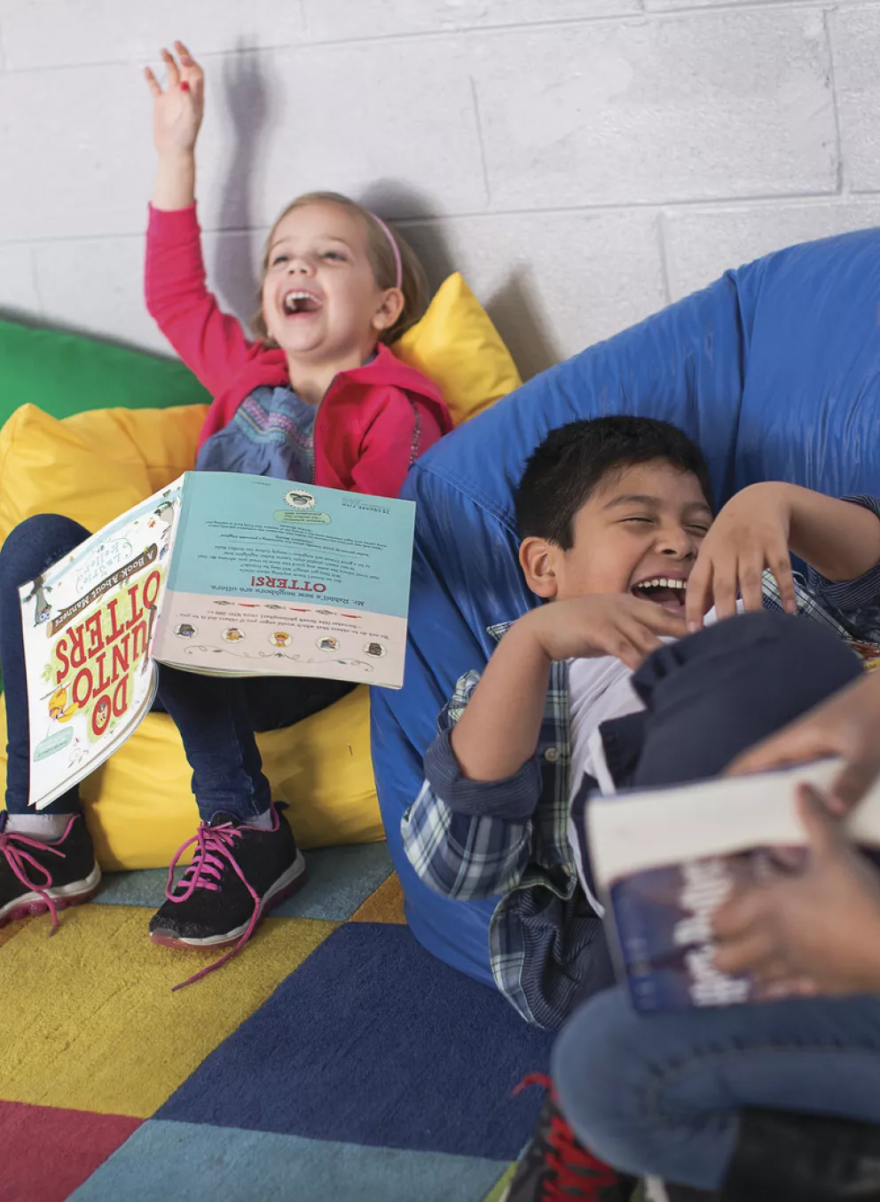 Kids laughing and reading