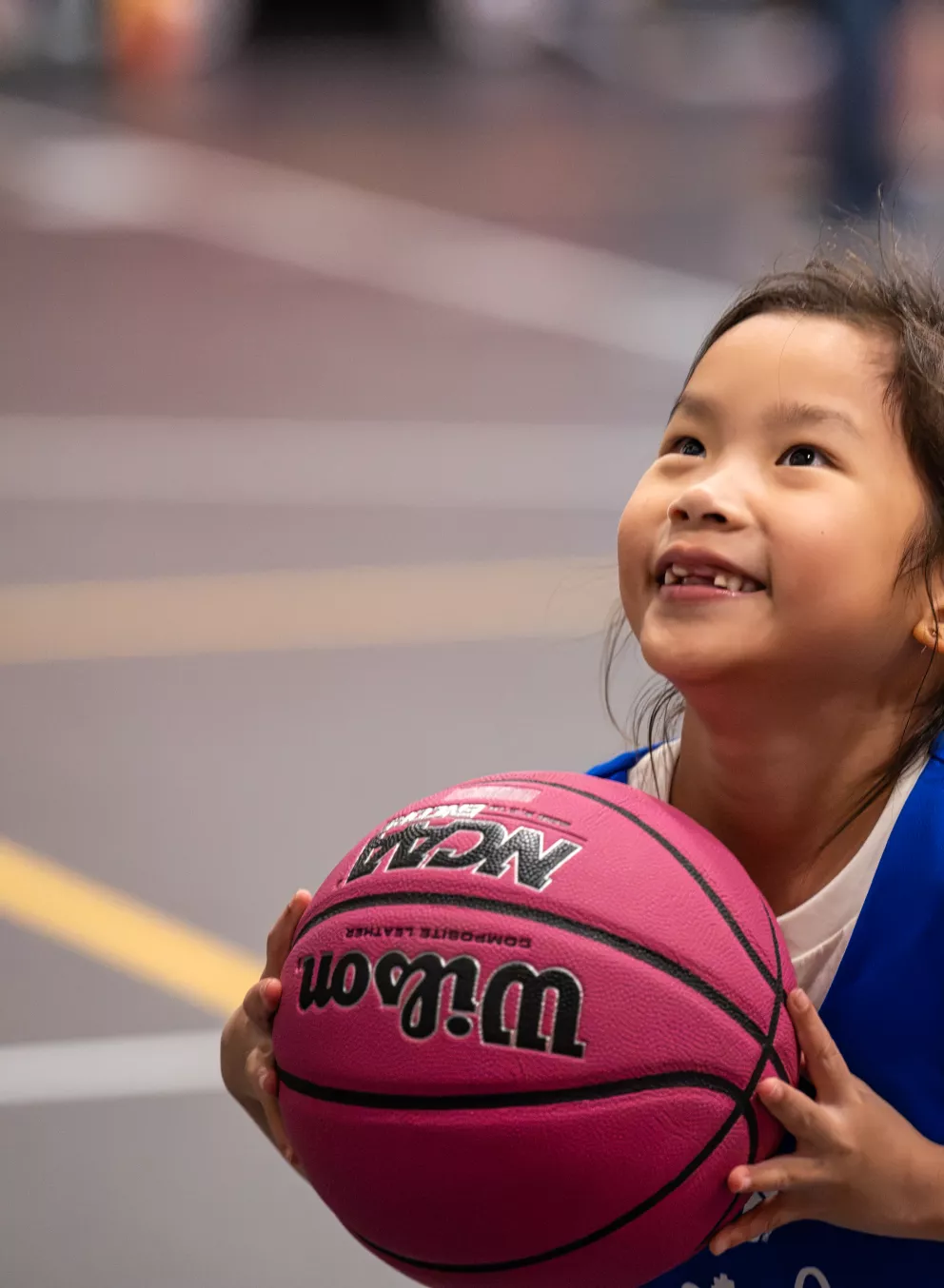 YMCA Youth Basketball member taking a shot