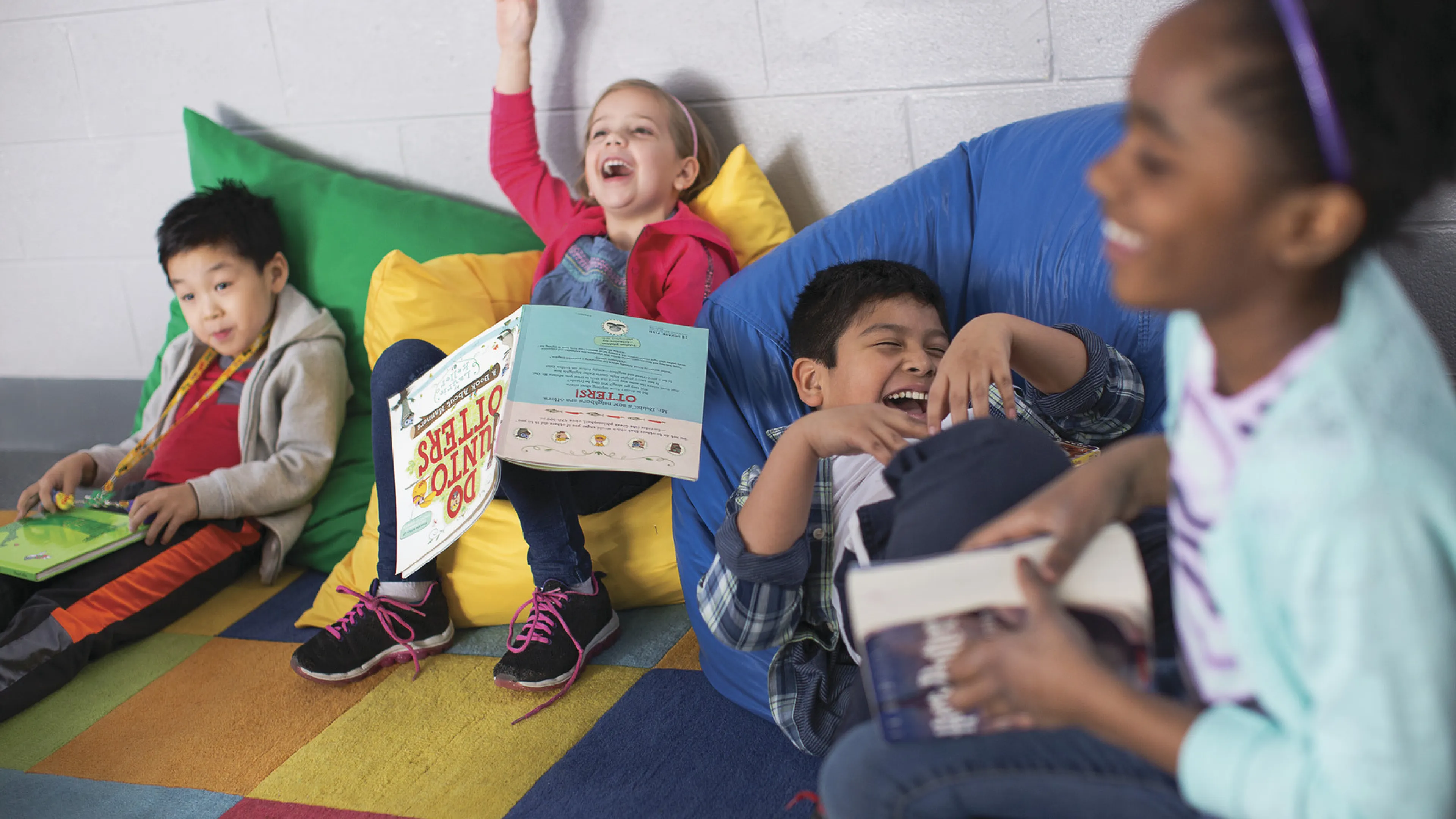 Kids laughing and reading