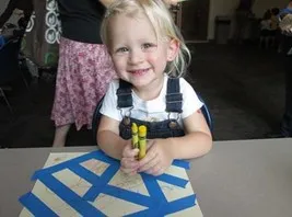 Little girl posing during craft time
