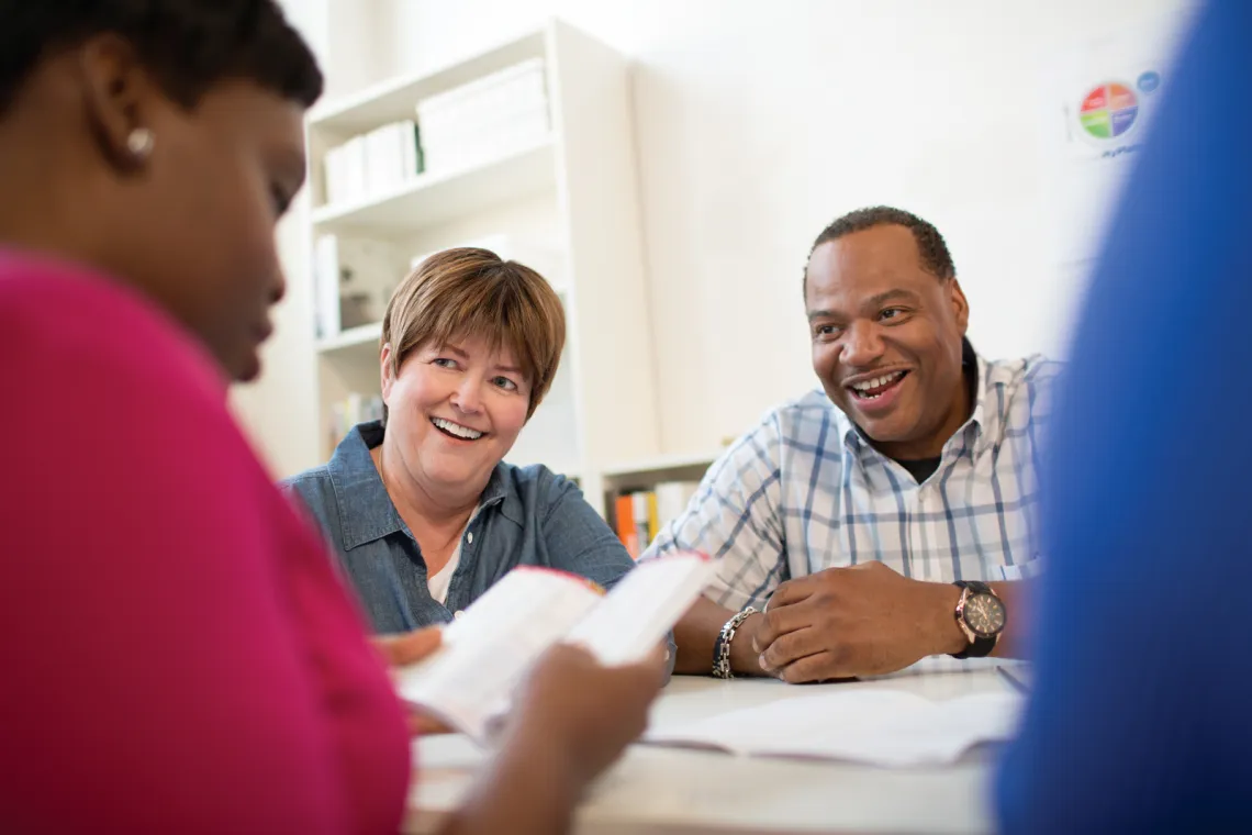 Male and female receiving nutrition coaching 