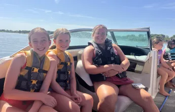 A camp counsler and her 5th grade girls get ready to tube on Lake Lewisville