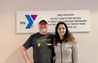 A photo of Chris with Plano Livestrong Coach Priyanka Sharma