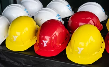 Hard Hats with Y Logos on them