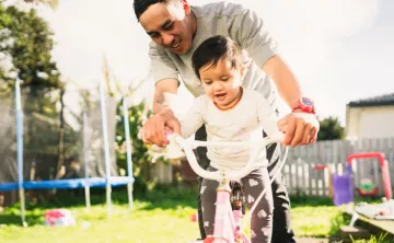 Father and Daughter on a bike