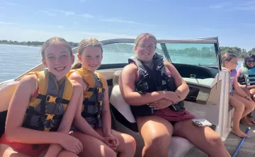 A camp counsler and her 5th grade girls get ready to tube on Lake Lewisville
